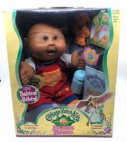 Front view of the boxed Cabbage Patch Kids Brendan Demetrius doll showing the doll, packaging, and accessories clearly in original packaging.