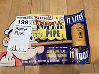Full view of pipe and original packaging on tabletop