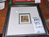 Framed art print with a white mat and black frame. View shows full framing and matting with MaxSold tag visible.