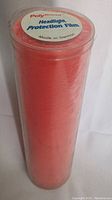 Single tall roll of red 'Poly Headlight Protection Film' in factory packaging, labeled Made in Germany.