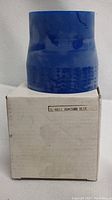 Blue silicone pipe coupling displayed on a white box with label showing size 60*70mm.