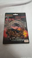Soft duct LED light strip in factory packaging with multi-colored LED indicators, steady 12V AC/DC