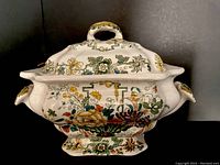 Front view of the Mason's Strathmore ironstone soup tureen with floral decoration and lid, showing overall shape and design.