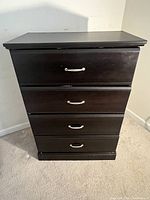 Front view of the classic 5 drawer dresser showing the dark brown finish and silver-tone handles