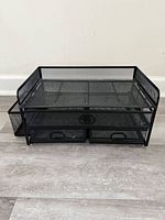 Full front view of the desk organizer showing the top tray, 3 sliding mesh drawers, and left-side utensil compartments.