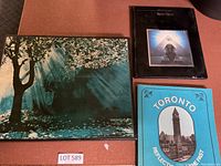 Three books shown together, including Toronto Reflections of the Past, tree cover book, and Nippon Themes.