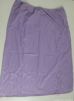 Full view of the lilac half slip, showing overall condition and color.