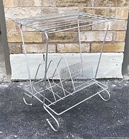 Front view of Mid-Century Modern metal wire LP record stereo stand, showing divider racks and top shelf.