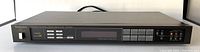 Front view of the Technics ST-S505 tuner, showing controls, buttons and power switch.