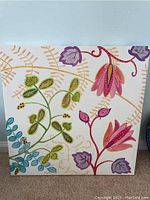Large 2 ft x 2 ft floral canvas with pink, purple, green, and blue leaves and flowers.