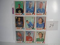 Sheet of 9 hockey cards from 1969-70 featuring NHL players from Bruins, Rangers, Kings, Blues, Canadiens, Red Wings, and Seals.