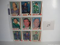 Sheet #3 displaying nine individual hockey cards from the 1969-70 NHL season in a plastic protective page.