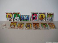 12 vintage 1971-72 O-Pee-Chee hockey cards arranged in two rows, showing different NHL players with various teams and positions.