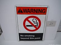 Front view of the aluminum no smoking warning sign showing the graphics and text clearly.