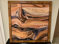 Front view of the framed abstract painting showing the full artwork and frame.
