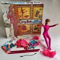 Wide view of Living Barbie Action Accents set: doll, original box, outfits, accessories displayed