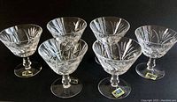 Front angle showing full set of six crystal sherbet glasses with original Lausitzer labels attached and intricate cut designs.