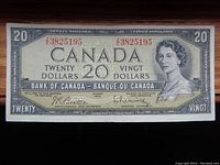 Front side of the 1954 Canadian $20 bill showing the full note with portrait of Queen Elizabeth II and serial number Z/38 25195.