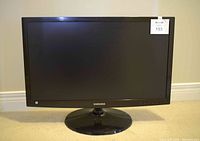Front view of the Samsung monitor showing the screen and bezel.
