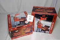 Two factory sealed boxes of Jax Jealous Devil BBQ pellets, each 20lbs, total 40lbs, displayed with lot tag.