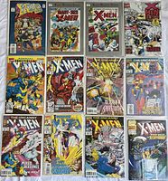 Full overview of the 12 X-Men Marvel comics laid out, visible front covers with characters and titles