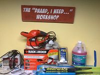 Black & Decker random orbit polisher in original box, with bonnet and sign above