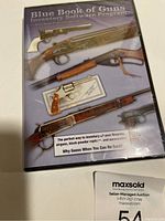 Front cover of Blue Book of Guns Inventory Software Program showing detailed firearm illustrations and software title.