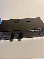 Black Echo Megaloop device with control knobs and indicators