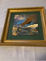 Framed abstract mixed media painting showing full artwork and frame.