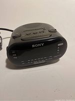 Front angled view showing digital display and control buttons of the Sony Dream Machine clock radio.