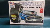 Front of the AMT Polyglas Gasser II model kit box showing artwork of the 1963 blue car with Goodyear Polyglas tires.