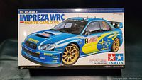 Closed box with front cover showing Subaru Impreza WRC Monte Carlo 2005 model picture and branding.