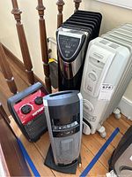 Four space heaters together showing different sizes and types: Melko, DeLonghi, Patton, Bionaire.