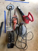 Overall view of metal detector, hedge trimmer, blower and floor dryer