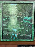 Full frontal view of the signed oil painting and custom green frame