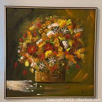 Full view of the floral oil painting in its frame, showing the colorful flower arrangement and overall size.