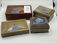 Four boxes arranged front view with size labels