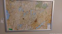 Framed wall map of Kawartha Lakes showing the overall map and frame.