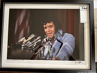 Front view of the framed limited edition Elvis Presley photograph showing the black frame, white mat, and print