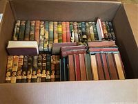 Box of vintage books including Beverly Gray and Betsy Allen titles from the Connie Blair mystery series, showing spines and edges.
