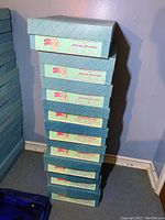 Stacked boxes of Madame Alexander First Lady Dolls from Series 2.