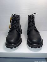 Front view of black Bonanza men's boots size 8 showing round toe, black laces, and rugged sole.