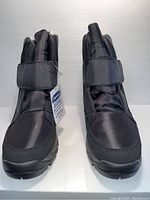 Front view of pair of new black Ciabatta’s unisex boots showing wide Velcro strap and padded upper