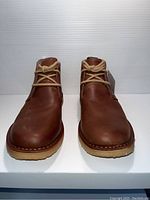 Front view of the brown men's leather shoes in size 9.