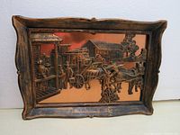 Full view of vintage framed copper relief artwork showing horse-drawn wagon scene.