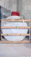 Round marble table top crated in wooden crate