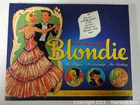 Front cover showing colorful vintage comic strip artwork of Blondie and Dagwood dancing with series title and theme icons.