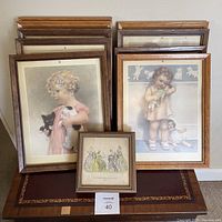Overall lot of 10 picture frames including vintage prints of children and historical fashion illustration.