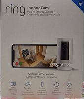 Front of the product box showing Ring Indoor Cam, with icons for 1080p HD Video, Two-Way Talk, Motion Activated, Easy Install, and Night Vision.