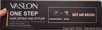 Photo of box front showing Vaslon One Step Hair Dryer and Styler hot air brush with features described